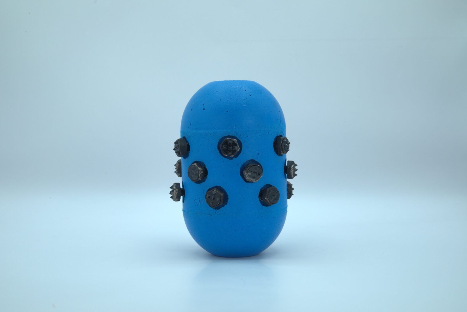 A Single Blue Urethane Pig with PipeCo Pigs HDC-5 Pigging Stud