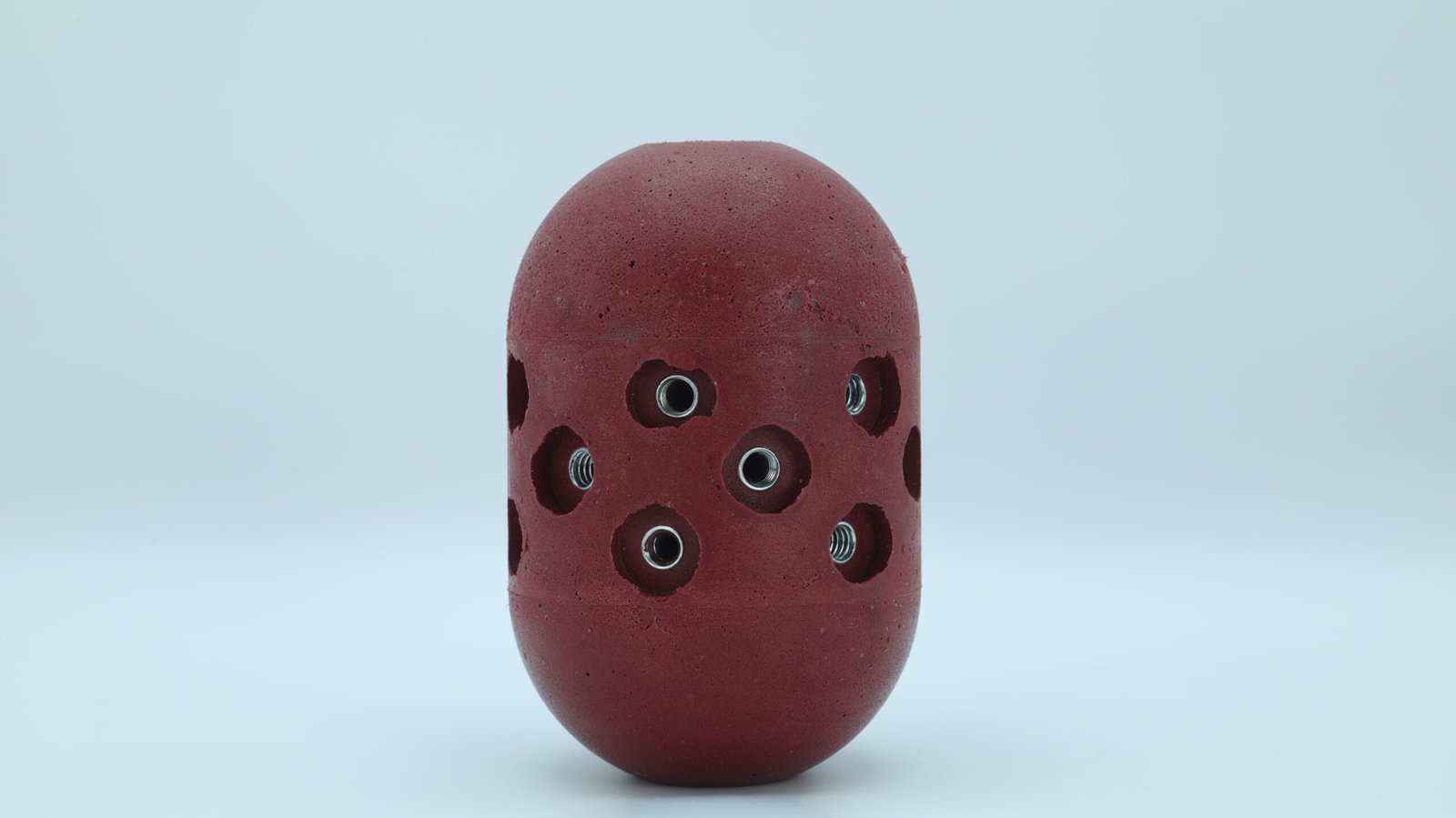 Red Urathane Pig used to house Pigging Studs